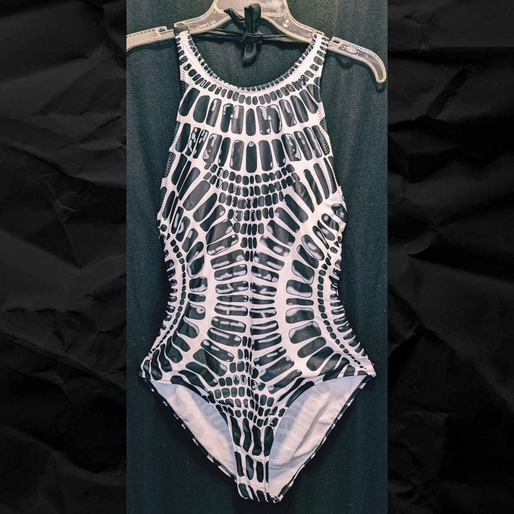 Sexy one piece suit with criss-cross back - EUC